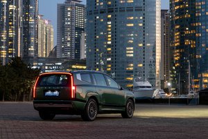 Hyundai IONIQ 9 Parked In Front Of Skyscrapers