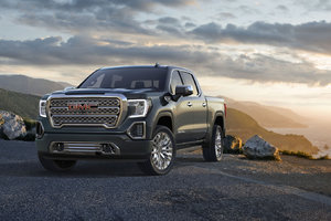 Comparison between the 2024 GMC Sierra Denali  and the 2024 GMC Sierra Denali Ultimate