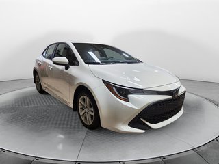 2021  Corolla Hatchback Base in Chicoutimi, Quebec - 2 - w320h240px