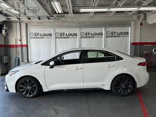 2025 Toyota COROLLA HYBRID SE AWD in Cowansville, Quebec - 2 - w320h240px