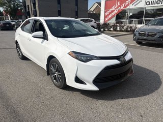 2018 Toyota Corolla LE 70,000 KM I HEATED SEATS AND STEERING WHEEL I CAMERA  I SUNROOF I MAGS I  ACTIVE SECURITY in Montréal, Quebec - 2 - w320h240px
