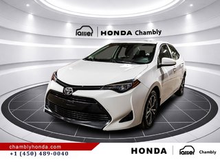 2018 Toyota Corolla LE 70,000 KM I HEATED SEATS AND STEERING WHEEL I CAMERA  I SUNROOF I MAGS I  ACTIVE SECURITY in Montréal, Quebec - 3 - w320h240px
