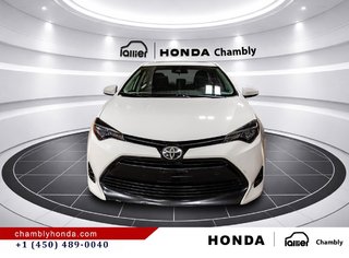 2018 Toyota Corolla LE 70,000 KM I HEATED SEATS AND STEERING WHEEL I CAMERA  I SUNROOF I MAGS I  ACTIVE SECURITY in Montréal, Quebec - 2 - w320h240px