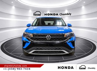 2022 Volkswagen Taos Comfortline 4MOTION CARPLAY I MAGS I HEATED SEATS I CAMERA I ACTIVE SECURITY in Montréal, Quebec - 2 - w320h240px