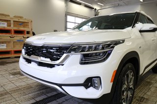 Kia Seltos  2023 à Saint-Eustache, Québec - 2 - w320h240px