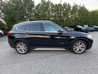 2018 BMW X1 xDrive28i in Pointe-Aux-Trembles, Quebec - 5 - w320h240px