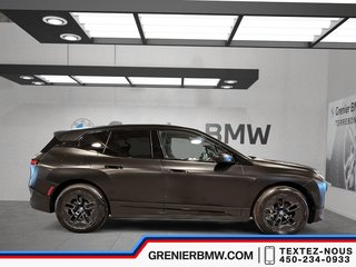 BMW IX XDrive50, Premium Essential, Black wraped 2023 à Terrebonne, Québec - 3 - w320h240px