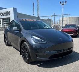 2024 Tesla Model Y in Montreal, Quebec - 3 - w320h240px
