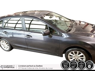 Subaru Impreza Tourisme, boîte manuelle à traction intégrale 2014 à Rivière-du-loup, Québec - 4 - w320h240px