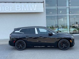 BMW IX XDrive60 2026 à Terrebonne, Québec - 3 - w320h240px