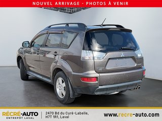 2011  Outlander 4WD LS + BANCS CHAUFFANTS + TEL QUEL!!! in Brossard, Quebec - 4 - w320h240px