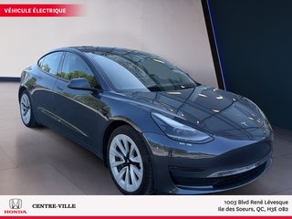 2022 Tesla Model 3 BASE in Montreal, Quebec - 2 - w320h240px