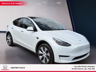 2023 Tesla Model Y Long Range in Montreal, Quebec - 2 - w320h240px