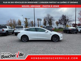 2020 Tesla Model 3 Standard Range Plus in Terrebonne, Quebec - 5 - w320h240px