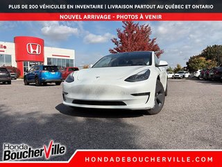 2023 Tesla Model 3 STD RANGE + in Terrebonne, Quebec - 2 - w320h240px
