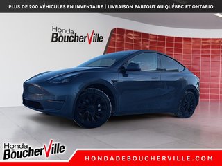 2023 Tesla Model Y RWD in Terrebonne, Quebec - 2 - w320h240px