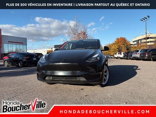 Tesla Model Y STD RANGE 2024 à Terrebonne, Québec - 2 - w320h240px