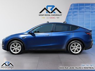 2021 Tesla Model Y Long Range in Montreal, Quebec - 2 - w320h240px