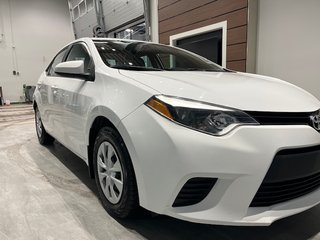 Toyota Corolla CE 2015 à Rivière-du-Loup, Québec - 2 - w320h240px