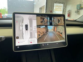 Tesla Model Y  2024 à St-Jérôme, Québec - 13 - w320h240px