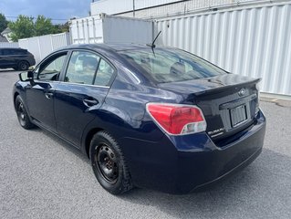 2015 Subaru Impreza in Brossard, Quebec - 4 - w320h240px