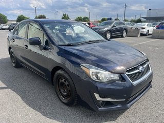2015 Subaru Impreza in Brossard, Quebec - 3 - w320h240px