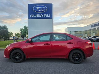 2016 Toyota Corolla LE in Brossard, Quebec - 2 - w320h240px