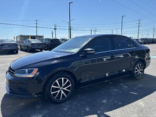 2016 Volkswagen Jetta Sedan 4dr Auto 1.8T Sport PZEV in Saint-Georges, Quebec - 3 - w320h240px