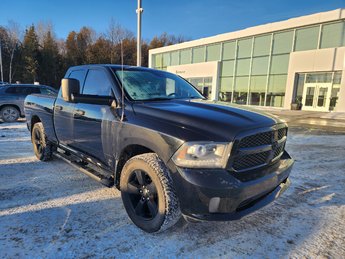 2014 Ram 1500 4WD Quad Cab 140.5  ST