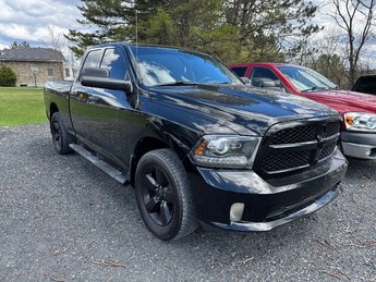 2014 Ram 1500 4WD Quad Cab 140.5  ST