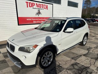 2012 BMW X1 28i - cruise control, heated seats, a/c, cd player