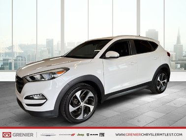 Tucson PREMIUM + AWD + BAS KILO + BLUETOOTH