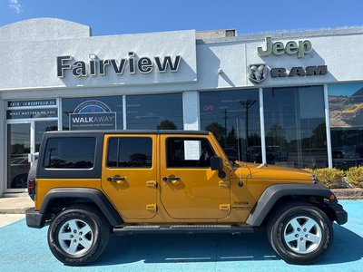 2014 Jeep Wrangler Unlimited Sport Amazing condition, power windows, AC, etc.