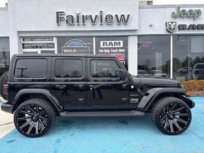 2024 Jeep Wrangler Sahara Fully loaded leather colour matching top over $7000 in tires and rims