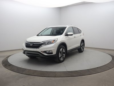 Honda CR-V Touring 2016 La fiabilité qui t’accompagne partout.