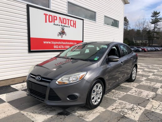 2014 Ford Focus SE- power windows and mirrors, am/fm radio