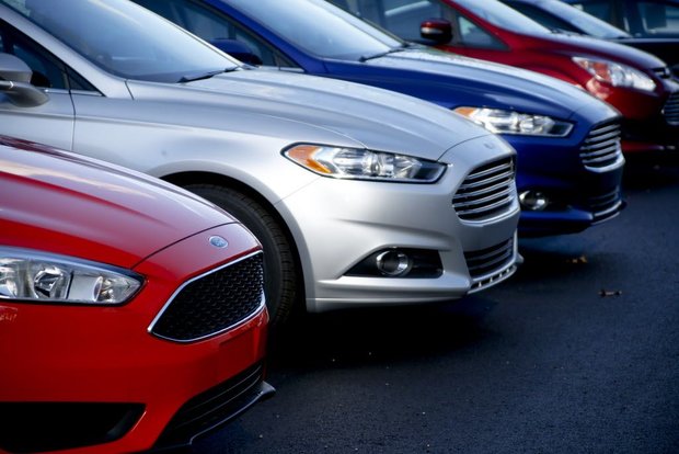 FORD CUTTING BACK ON PASSENGER CARS, FOCUSING ON TRUCKS, SUVS