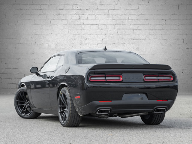 Triple black dodge top challenger