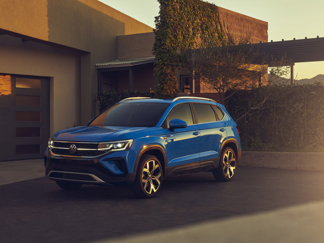 What sets the Volkswagen Taos 2023 apart from the Audi Q3 2023?