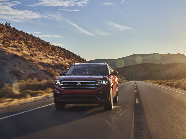 What sets the Volkswagen Atlas Cross Sport apart from the Volkswagen Tiguan?