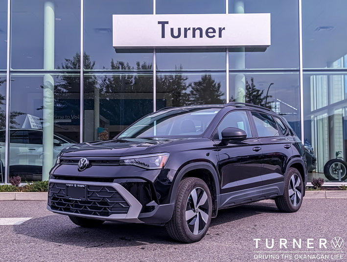 2025 Volkswagen Taos TRENDLINE FORMER TURNER SERVICE LOANER / ALL WHEEL DRIVE / SHAWDOW BLUE INTERIOR