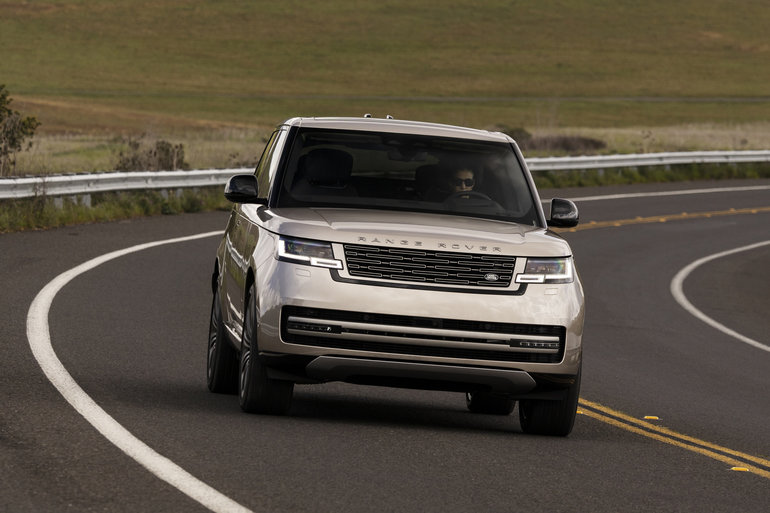 How does the 2023 Range Rover compare to the 2023 Cadillac Escalade ...