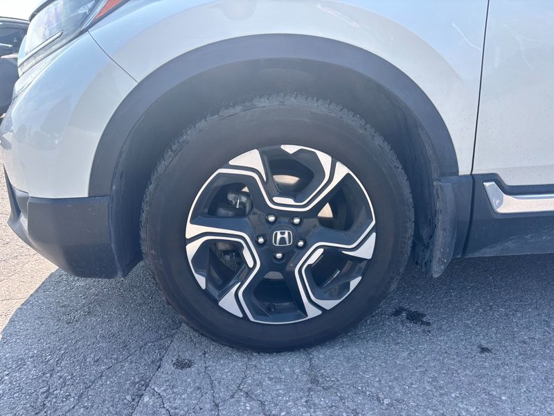 2017 Honda CR-V Touring Great condition. Includes snows on Alloy rims.