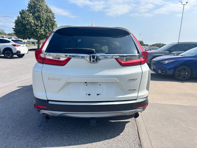 2017 Honda CR-V Touring Great condition. Includes snows on Alloy rims.