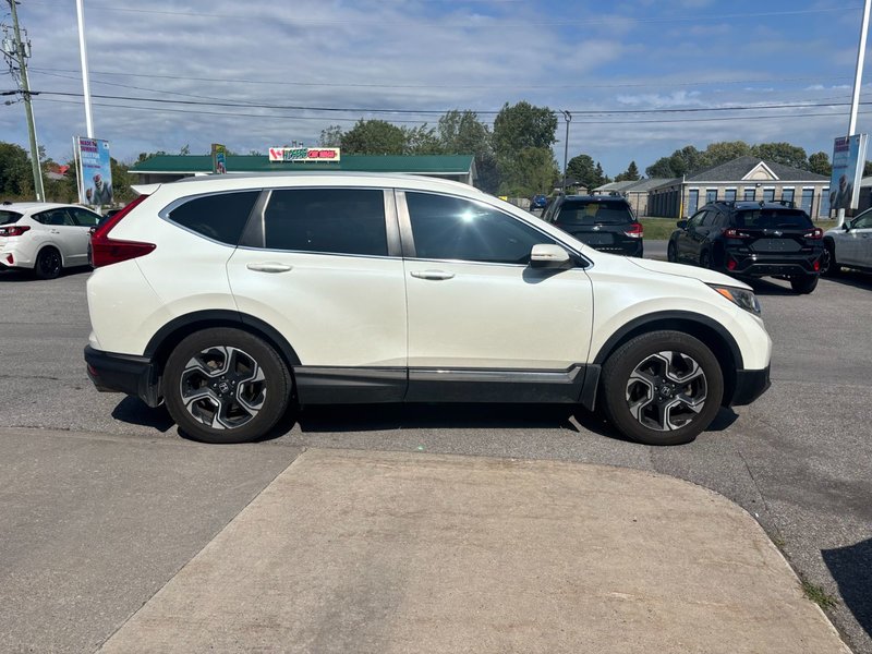 2017 Honda CR-V Touring Great condition. Includes snows on Alloy rims.