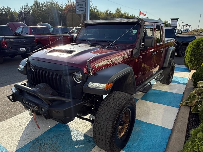 2021 Jeep Gladiator MOJAVE READY FOR WHATEVER ADVENTURE! Aftermarket wheels, bumper, side steps, and winch.