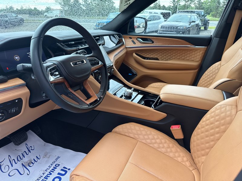 2023 Jeep Grand Cherokee 4xe Summit Reserve Upgraded leather  Macintosh audio system three TVs full roof