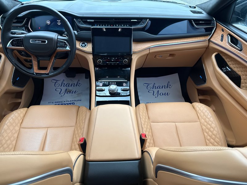 2023 Jeep Grand Cherokee 4xe Summit Reserve Upgraded leather  Macintosh audio system three TVs full roof