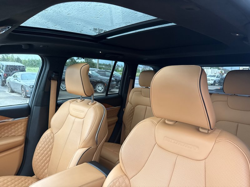 2023 Jeep Grand Cherokee 4xe Summit Reserve Upgraded leather  Macintosh audio system three TVs full roof