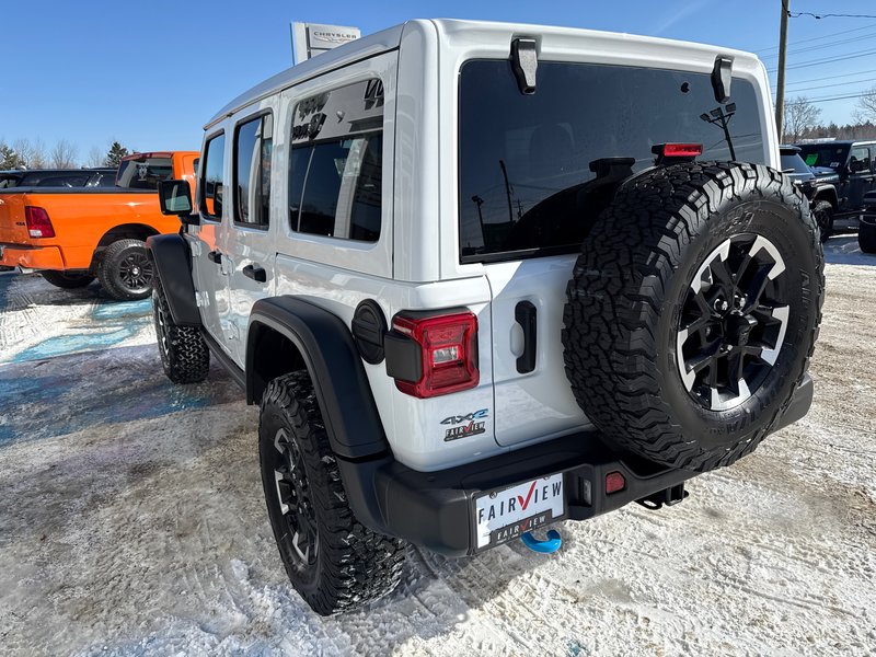 2024 Jeep Wrangler 4xe Rubicon Demo with 21,000 off sky, active roof, winch, steel bumpers sticker prices, 88K